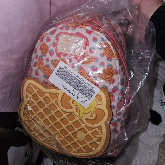 LOUNGEFLYHELLO KITTY: BREAKFAST WAFFLE | MINI BACKPACK Loungefly Sanrio Hello Kitty Waffle Scented Mini Backpack  main image 2